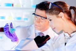Health care professionals working in laboratory.
