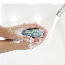 Person Washing hands with Soap