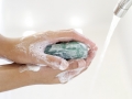 Person Washing hands with Soap